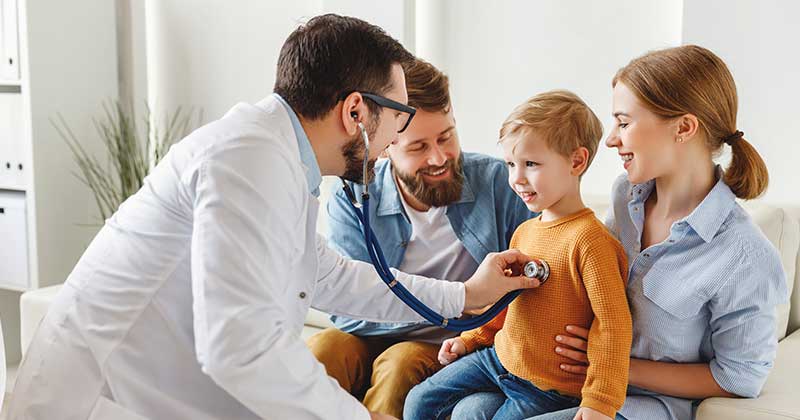 Male doctor seeing family