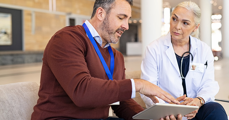 A3 - Finance guy talking with doctor