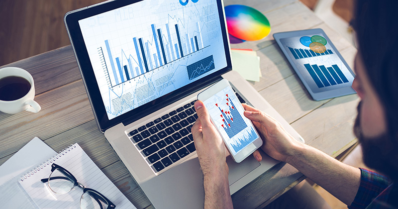 GRAPHS ON LAPTOP PHONE AND TABLET