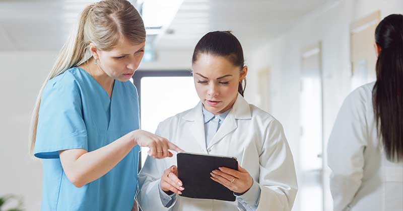 Medical staffs watching tablet