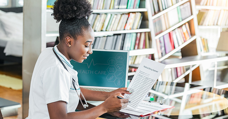 NURSE HOLDING PAPER