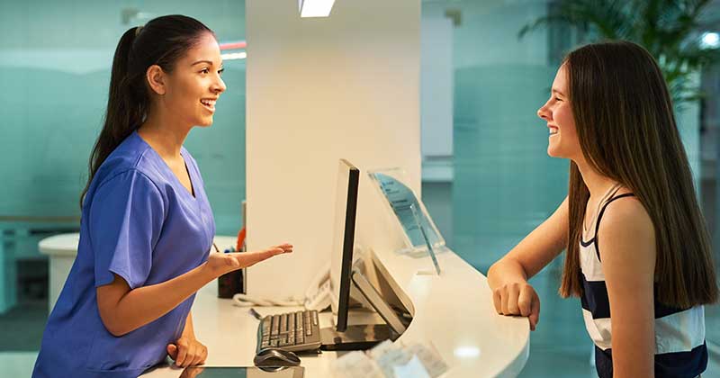 Medical Staff talking with patient